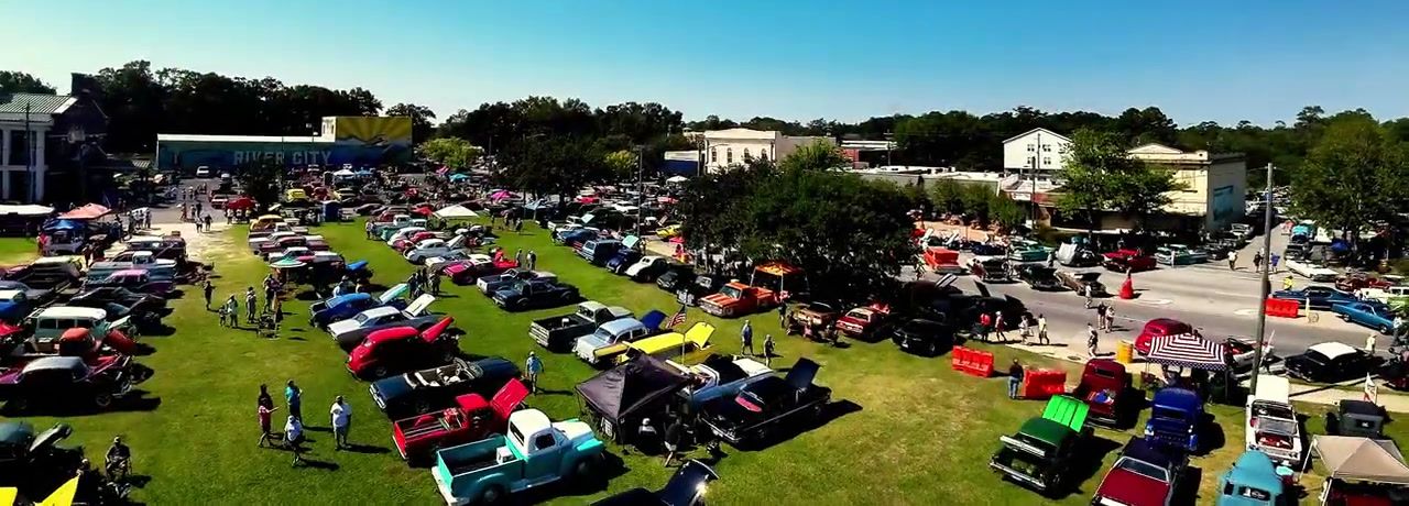 Aerial view of the Cruisin' the River City classic car show in downtown Moss Point