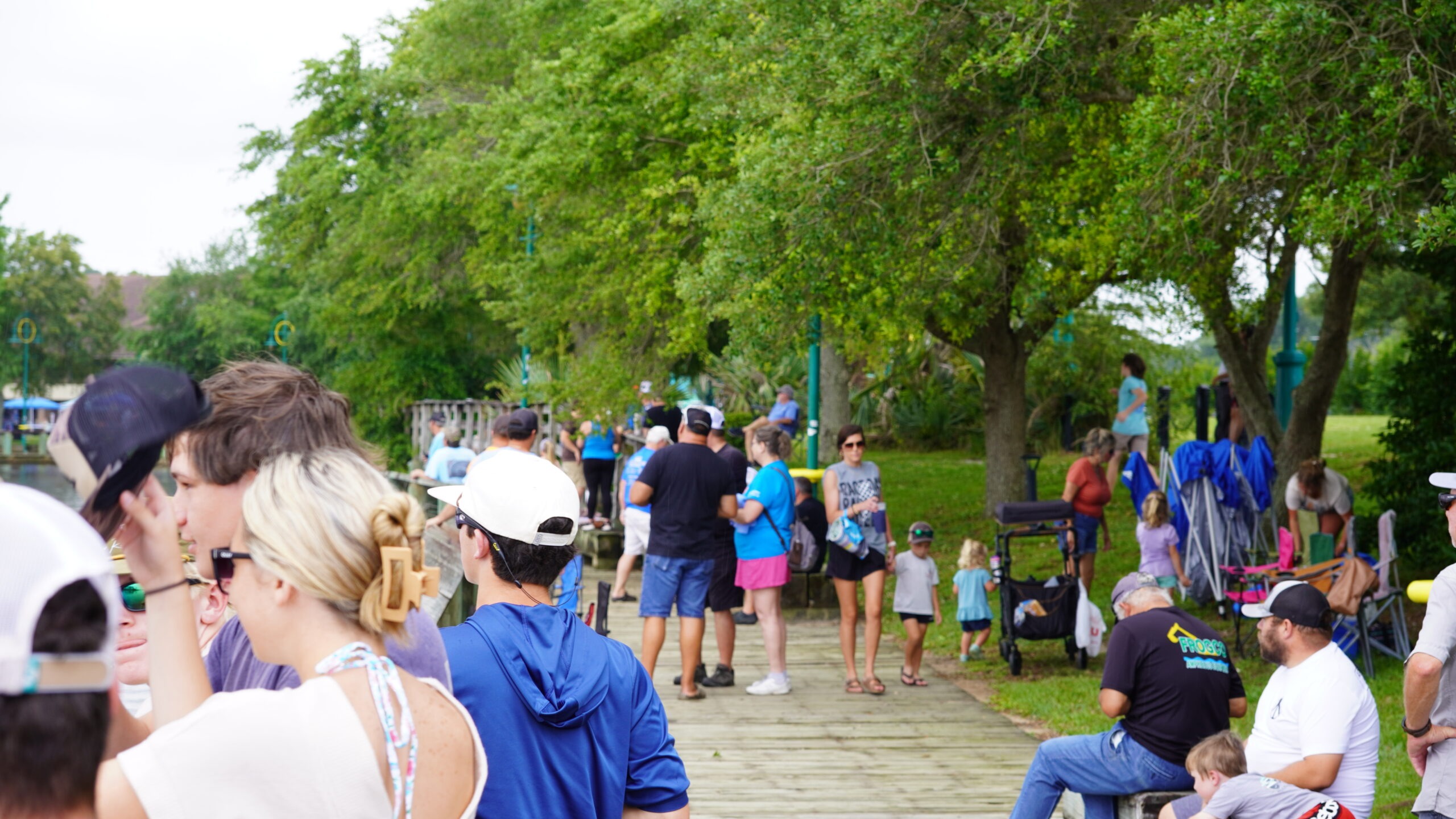 A crowd enjoying a festival on the Moss Point riverfront