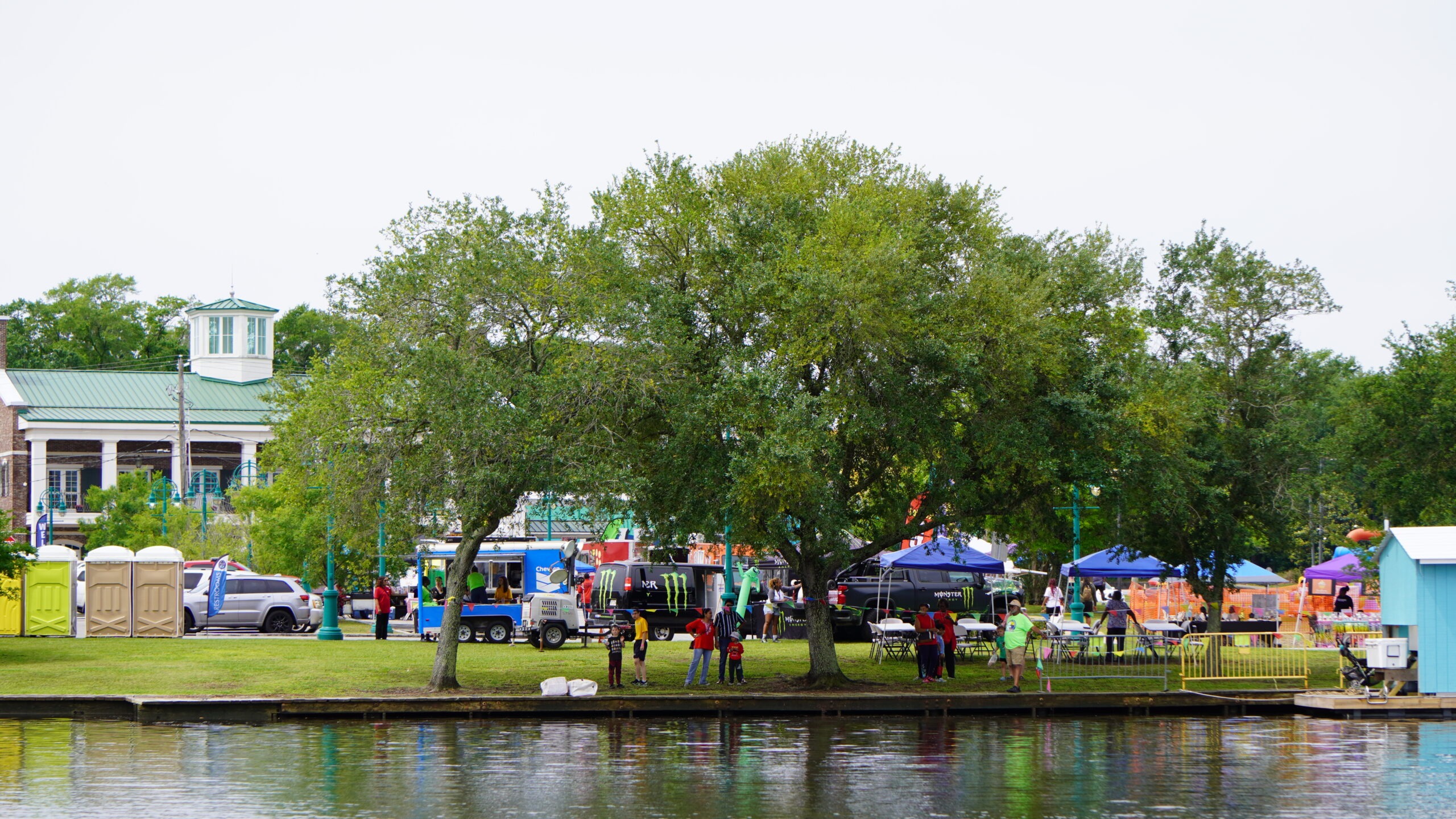 A festival crowd gathered on the Moss Point riverfront at Riverfront Park